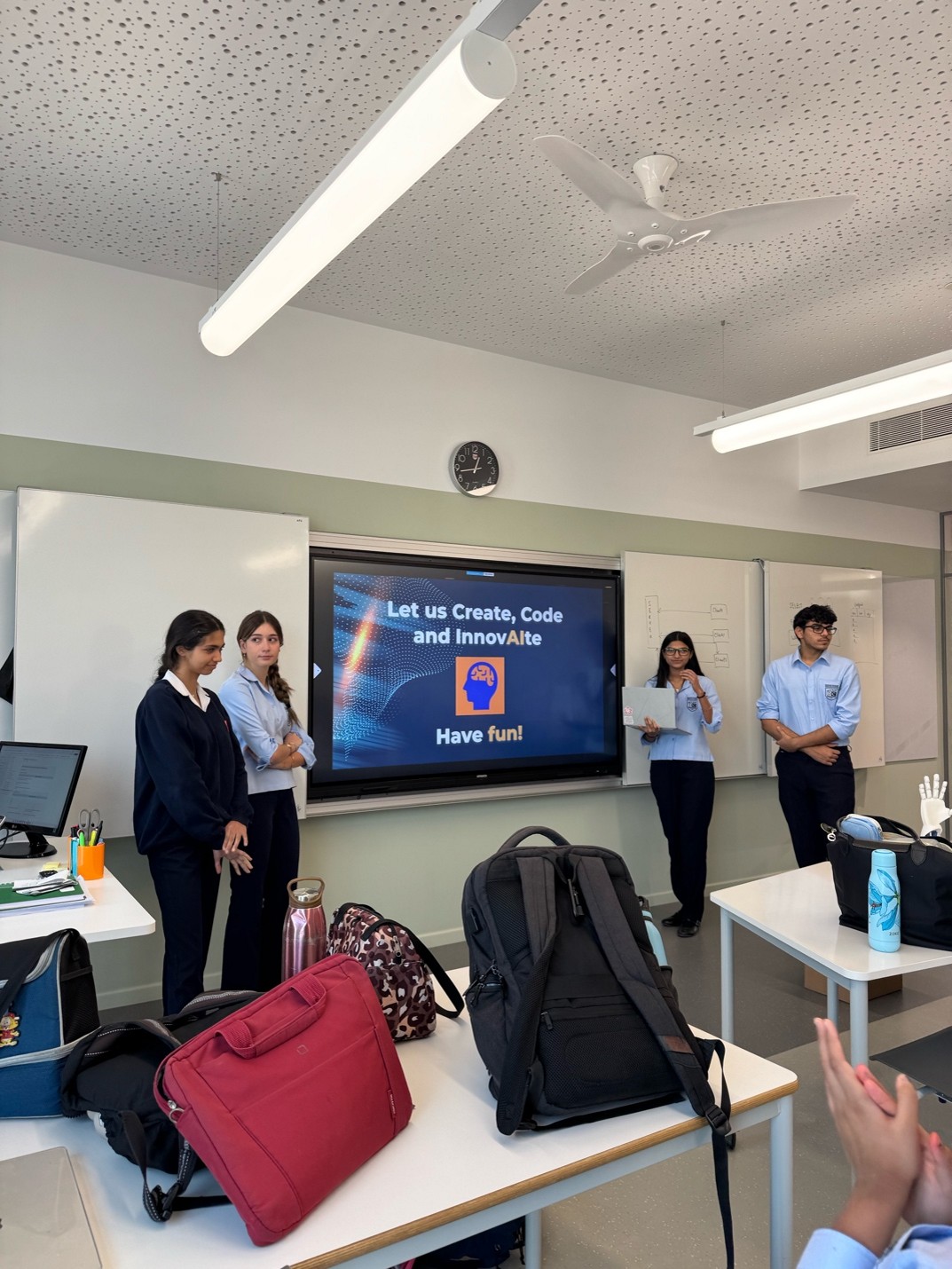 Students presenting at a DCSS InnovAIte hackathon at Dubai College